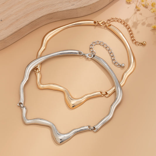 Collar asimetrico tipo gota de lava